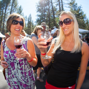 Friends enjoy tasty wine at Sample the Sierra